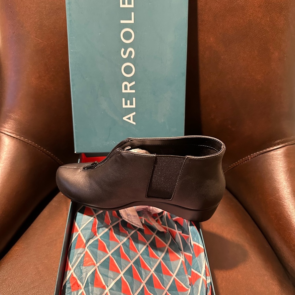 Aerosols Allowance Black Leather Wedge Ankle Bootie